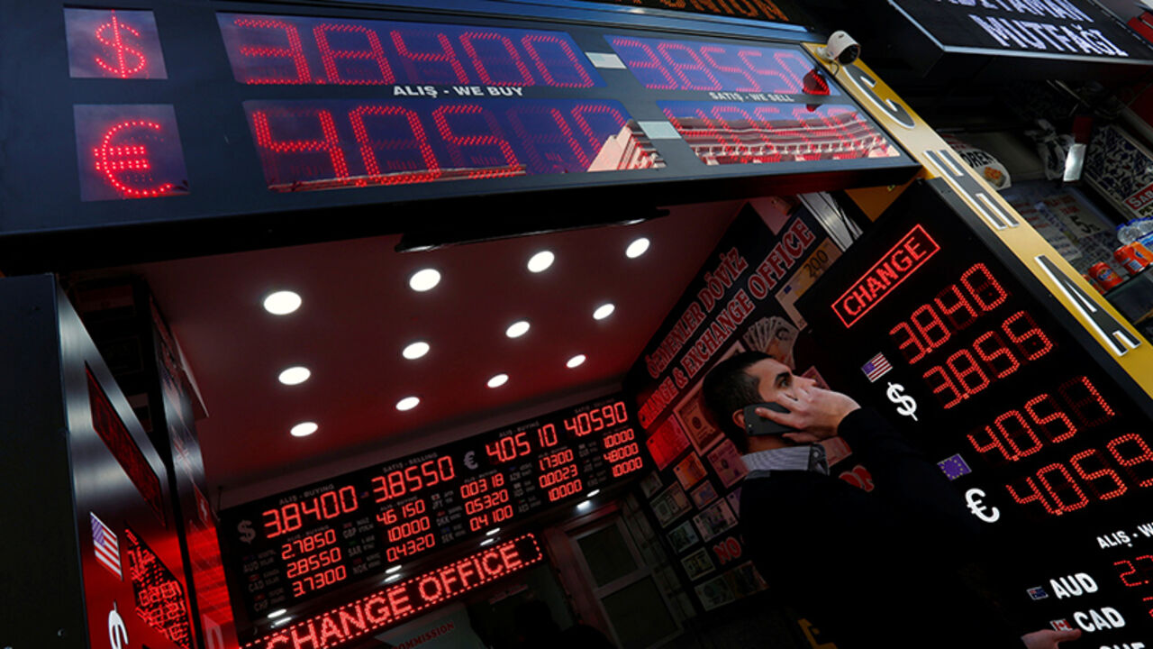 TURKEY-LIRA/ Boards showing the currency exchange rates of the U.S. dollar and the Euro against Turkish lira are on display at a currency exchange office in Istanbul, Turkey, January 11, 2017. REUTERS/Murad Sezer - RTX2YFYR