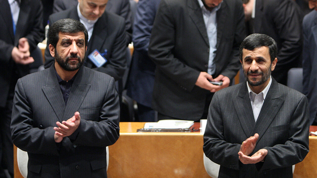 Nic206346 Iranian President Mahmoud Ahmadinejad (R) and head of Iran TV, Ezzatollah Zarghami, (L) applaud as they attend the 44th General assembly of the Asia-Pacific Broadcaasting Union in Tehran 03 November 2007. AFP PHOTO/ATTA KENARE (Photo credit should read ATTA KENARE/AFP/Getty Images)