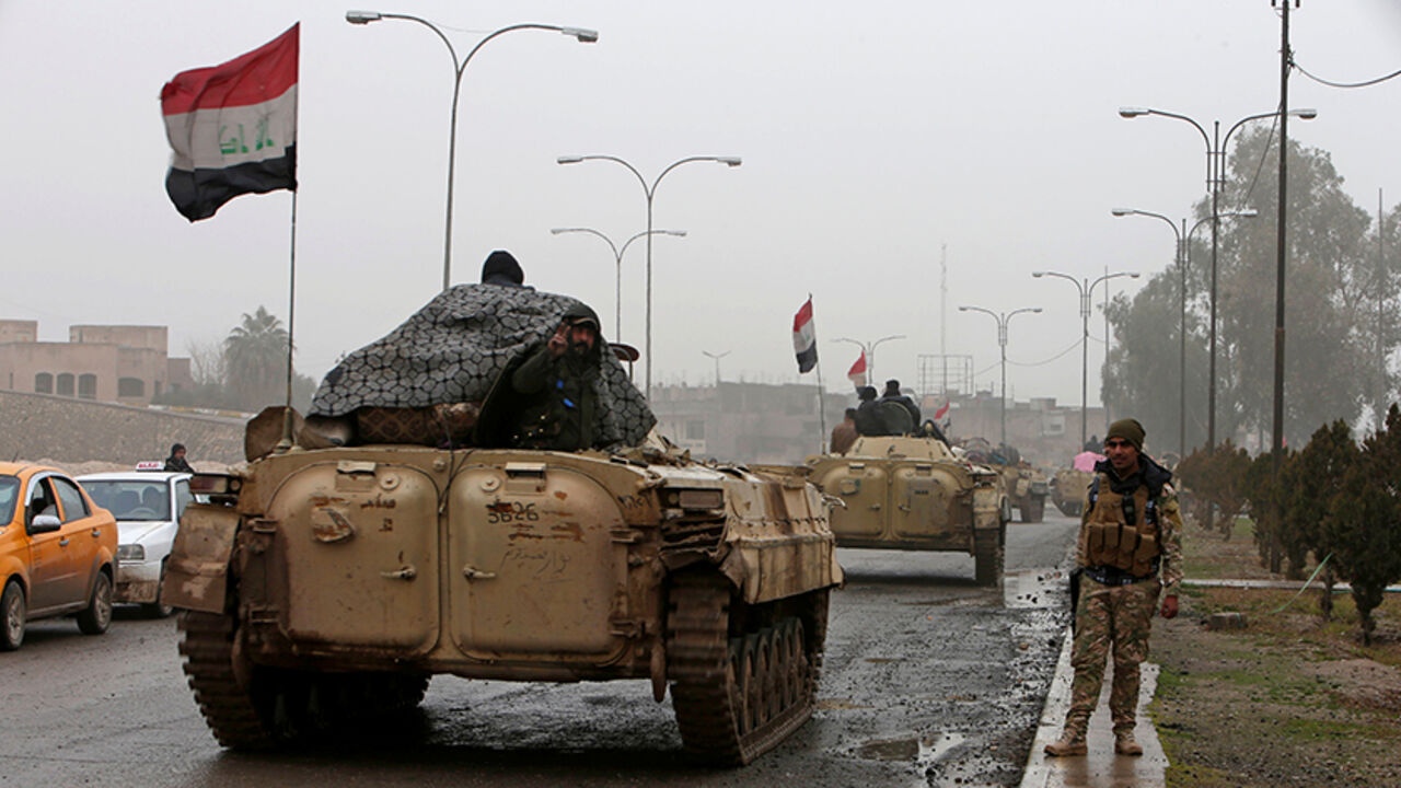 MIDEAST-CRISIS/IRAQ-MOSUL Iraqi army tanks are seen in Mosul, Iraq, January 28, 2017. REUTERS/Azad Lashkari - RTSXRKU