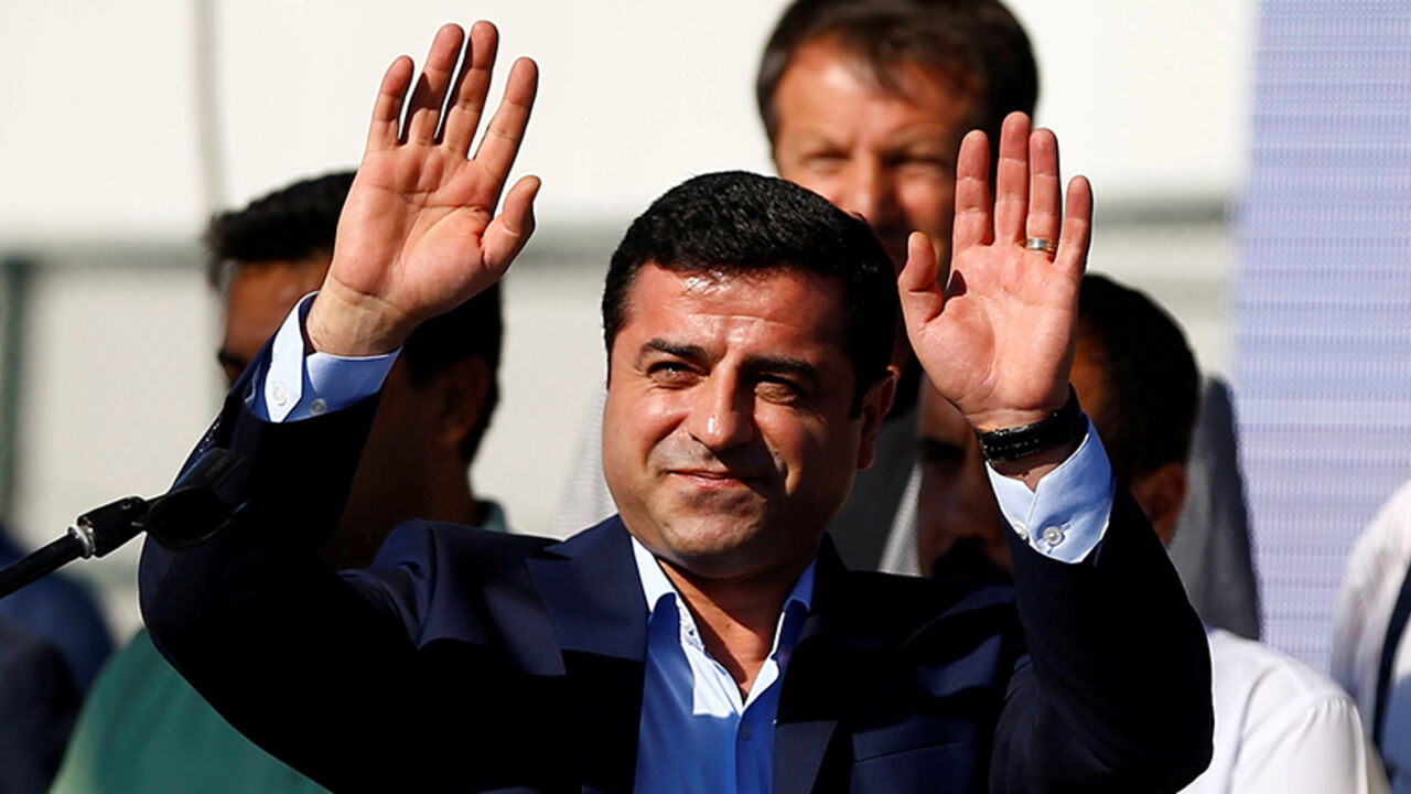 TURKEY-SECURITY/KURDS File Photo: Selahattin Demirtas, co-leader of the pro-Kurdish Peoples' Democratic Party (HDP), greets the crowd during a peace rally to protest against Turkish military operations in northern Syria, in Istanbul, Turkey, September 4, 2016. REUTERS/Osman Orsal/File Photo - RTX2RUA4