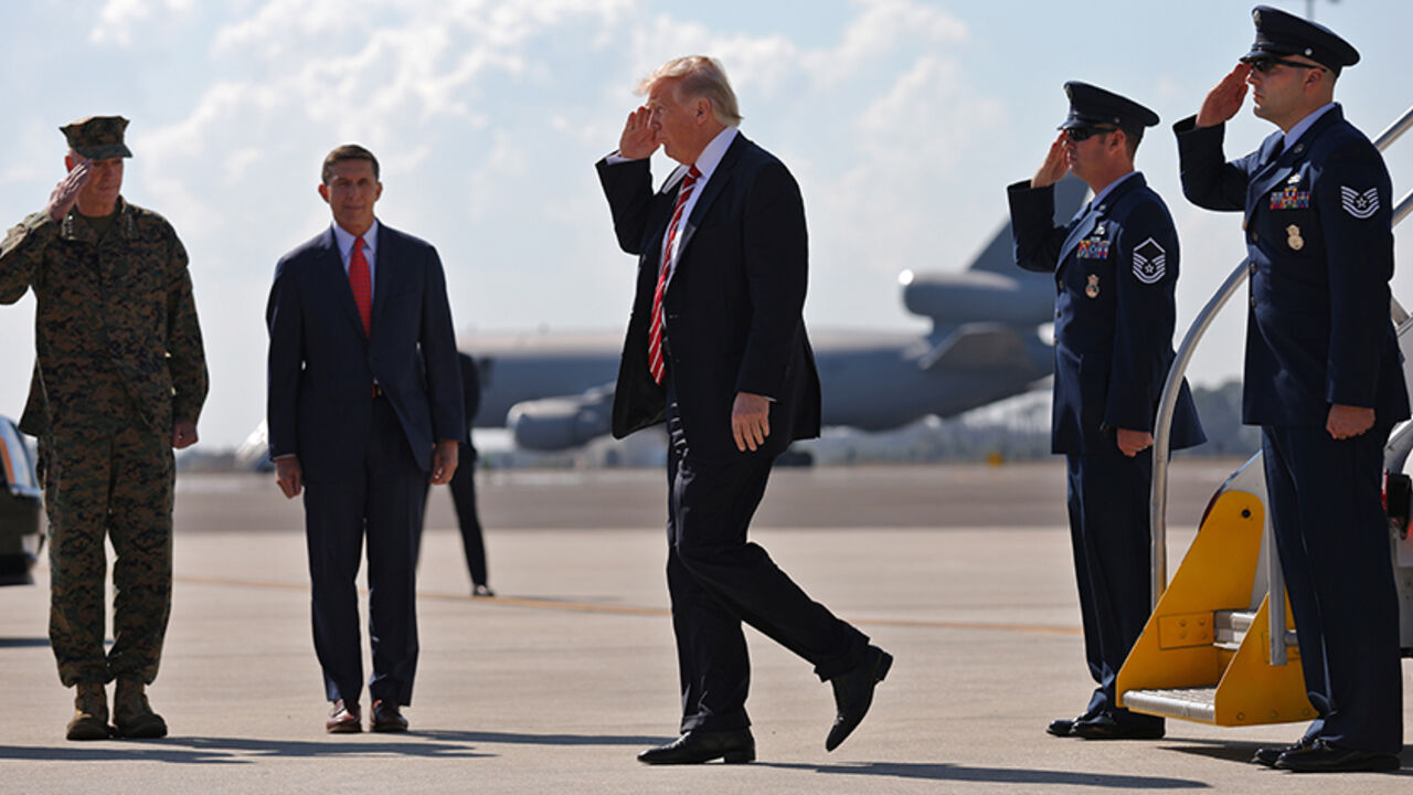 U.S. President Donald Trump  salutes as he arrives at MacDill Air Force Base in Tampa, Florida, U.S., February 6, 2017. REUTERS/Carlos Barria - RTX2ZVRM