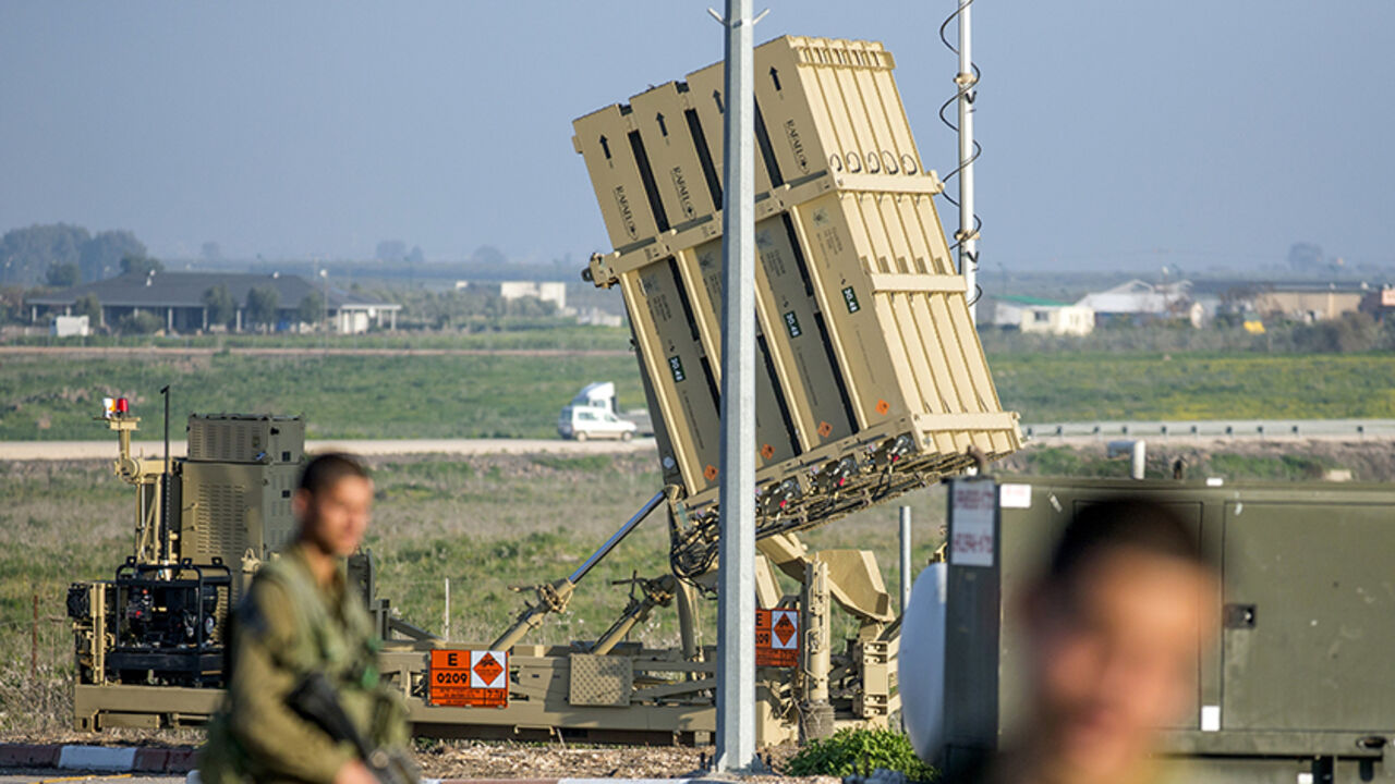 Nic6409099 Israeli soliders patrol near an Iron Dome defence system, designed to intercept and destroy incoming short-range rockets and artillery shells, in the Israeli-annexed Golan Heights, on January 20, 2015, two days after an Israeli air strike killed six Hezbollah members in the Syrian-controlled side of the Golan Heights. The strike on Syria killed an Iranian general, Tehran confirmed on January 19, as thousands of supporters of Lebanon's Hezbollah gathered to bury one of the six fighters killed in the same rai