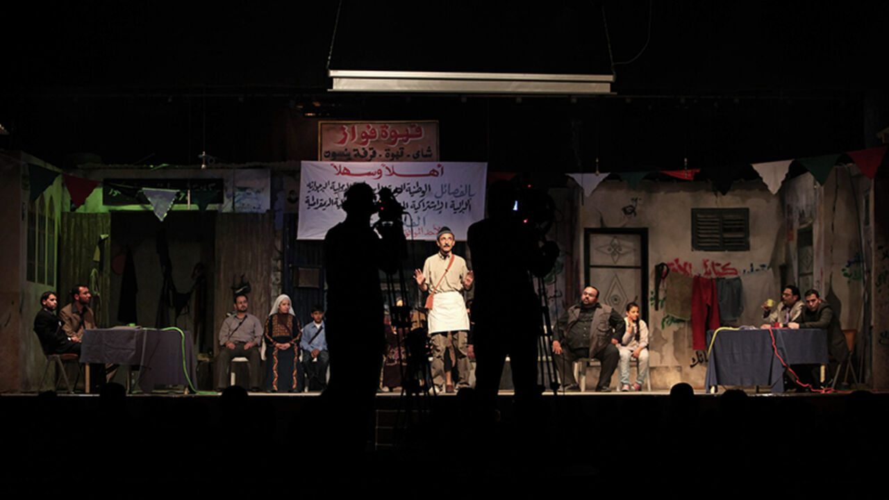 PALESTINIANS-GAZA/THEATRE Palestinian artists perform at al-Shawa theatre in Gaza City March 9, 2010. Live theatre is rare in the Gaza Strip; public criticism of its Islamist rulers is rare too. So perhaps it was no surprise that a play which gives vent to Palestinians' frustrations with their leaders should be a hit. Picture taken March 9, 2010. To match Reuters Life! PALESTINIANS-GAZA/THEATRE REUTERS/Suhaib Salem (GAZA - Tags: ENTERTAINMENT POLITICS SOCIETY) - RTR2BXPY