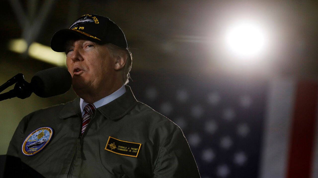 USA-TRUMP/DEFENSE U.S. President Donald Trump delivers remarks aboard the pre-commissioned U.S. Navy aircraft carrier Gerald R. Ford at Huntington Ingalls Newport News Shipbuilding facilities in Newport News, Virginia, U.S. March 2, 2017. REUTERS/Jonathan Ernst - RTS1177C