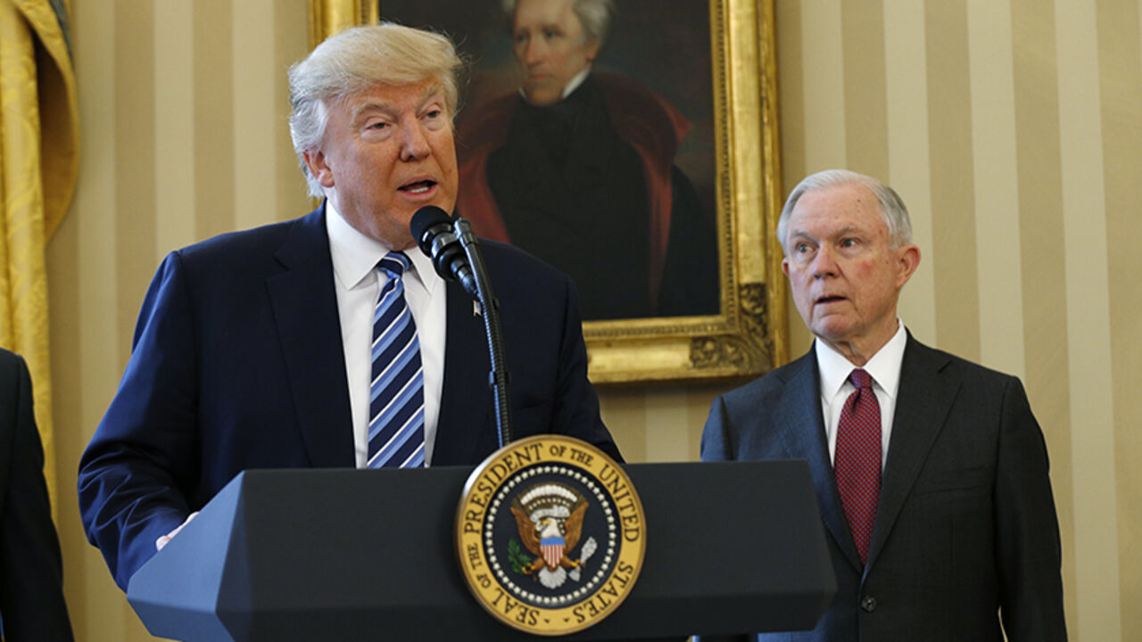 USA-TRUMP/SESSIONS U.S. President Donald Trump speaks during a swearing-in ceremony for new Attorney General Jeff Sessions (R) at the White House in Washington, U.S., February 9, 2017. REUTERS/Kevin Lamarque - RTX30D9Z