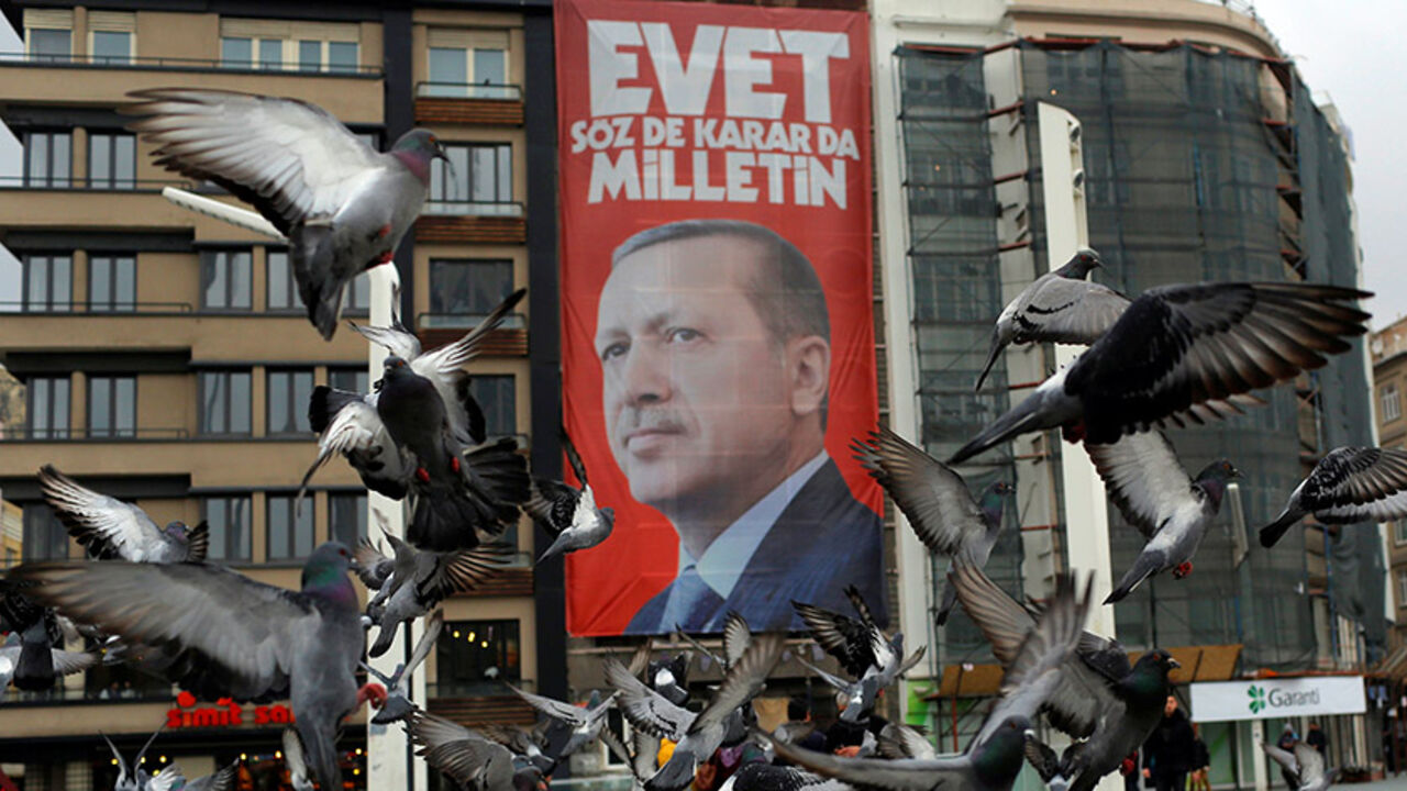 TURKEY-REFERENDUM/ A campaign banner for the upcoming referendum with the picture of Turkish President Tayyip Erdogan is seen on Taksim square in central Istanbul, Turkey March 15, 2017. REUTERS/Murad Sezer - RTX314BZ