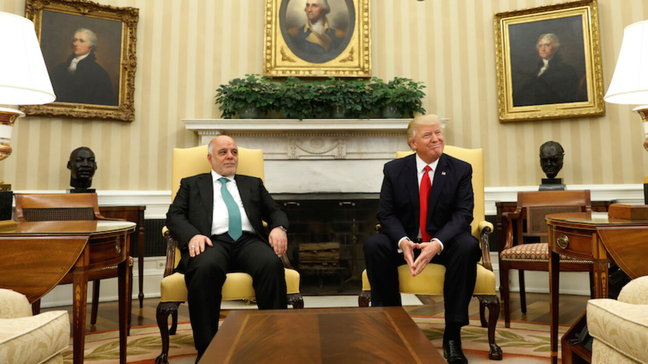 USA-TRUMP/IRAQ U.S. President Donald Trump meets with Iraqi Prime Minister Haider al-Abadi in the Oval Office at the White House in Washington, U.S., March 20, 2017. REUTERS/Kevin Lamarque - RTX31WQK