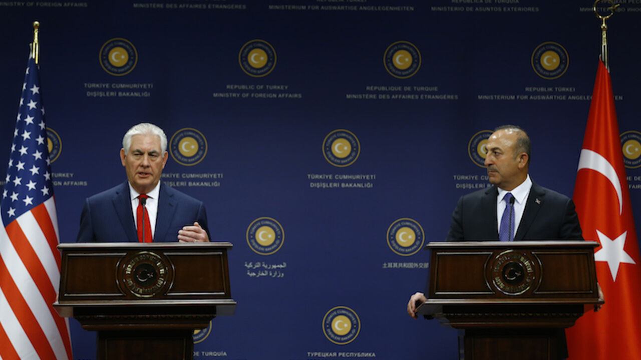 MIDEAST-CRISIS/TURKEY-USA U.S. Secretary of State Rex Tillerson and Turkish Foreign Minister Mevlut Cavusoglu attend a news conference in Ankara, Turkey, March 30, 2017. REUTERS/Umit Bektas - RTX33DCF