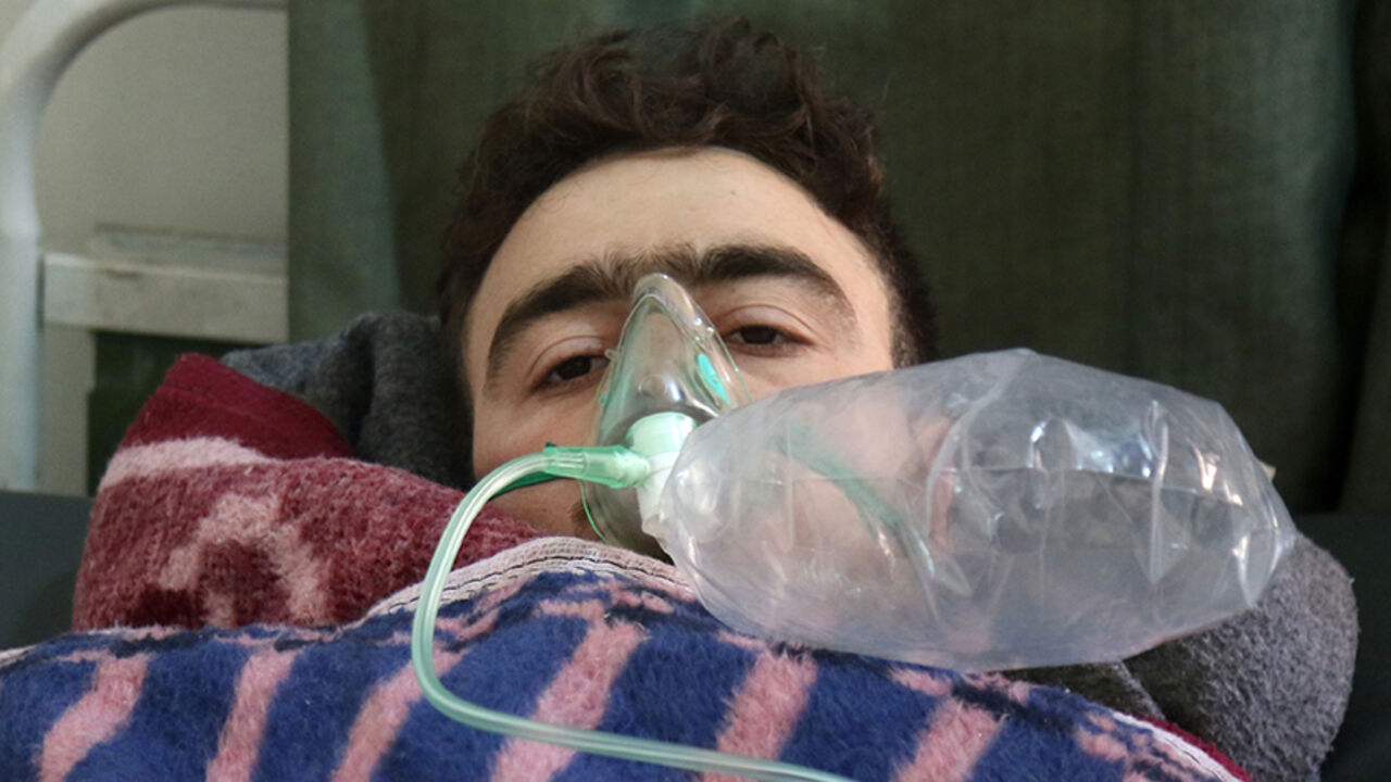 AFP_N899H A Syrian man receives treatment at a small hospital in the town of Maaret al-Noman following a suspected toxic gas attack in Khan Sheikhun, a nearby rebel-held town in Syrias northwestern Idlib province, on April 4, 2017.
Warplanes carried out a suspected toxic gas attack that killed at least 35 people including several children, a monitoring group said. The Syrian Observatory for Human Rights said those killed in the town of Khan Sheikhun, in Idlib province, had died from the effects of the gas, adding tha
