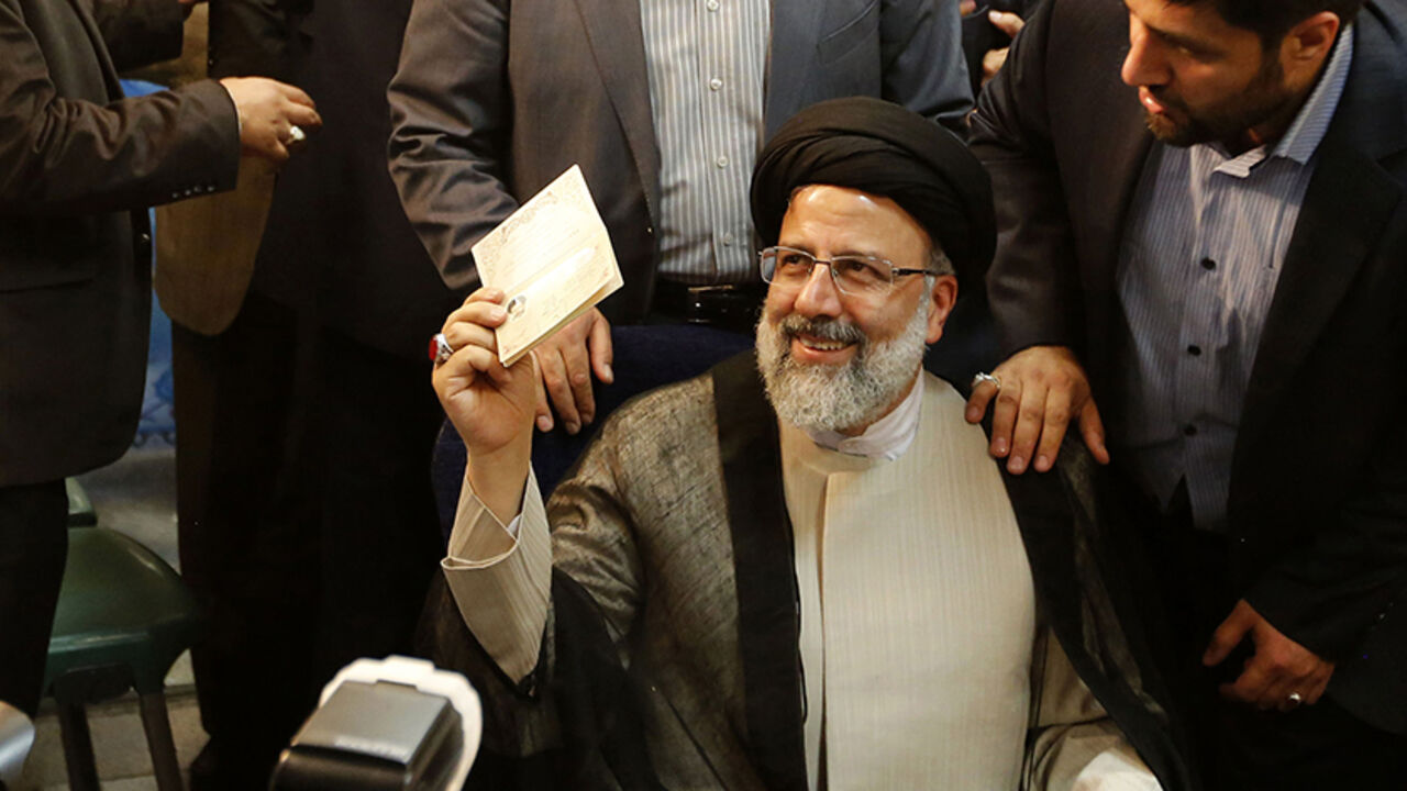 AFP_NK0UY Iranian cleric and head of the Imam Reza charitable foundation, Ebrahim Raisi, gestures after registering his candidacy for the upcoming presidential elections at the ministry of interior in the capital Tehran on April 14, 2017. / AFP PHOTO / ATTA KENARE (Photo credit should read ATTA KENARE/AFP/Getty Images)