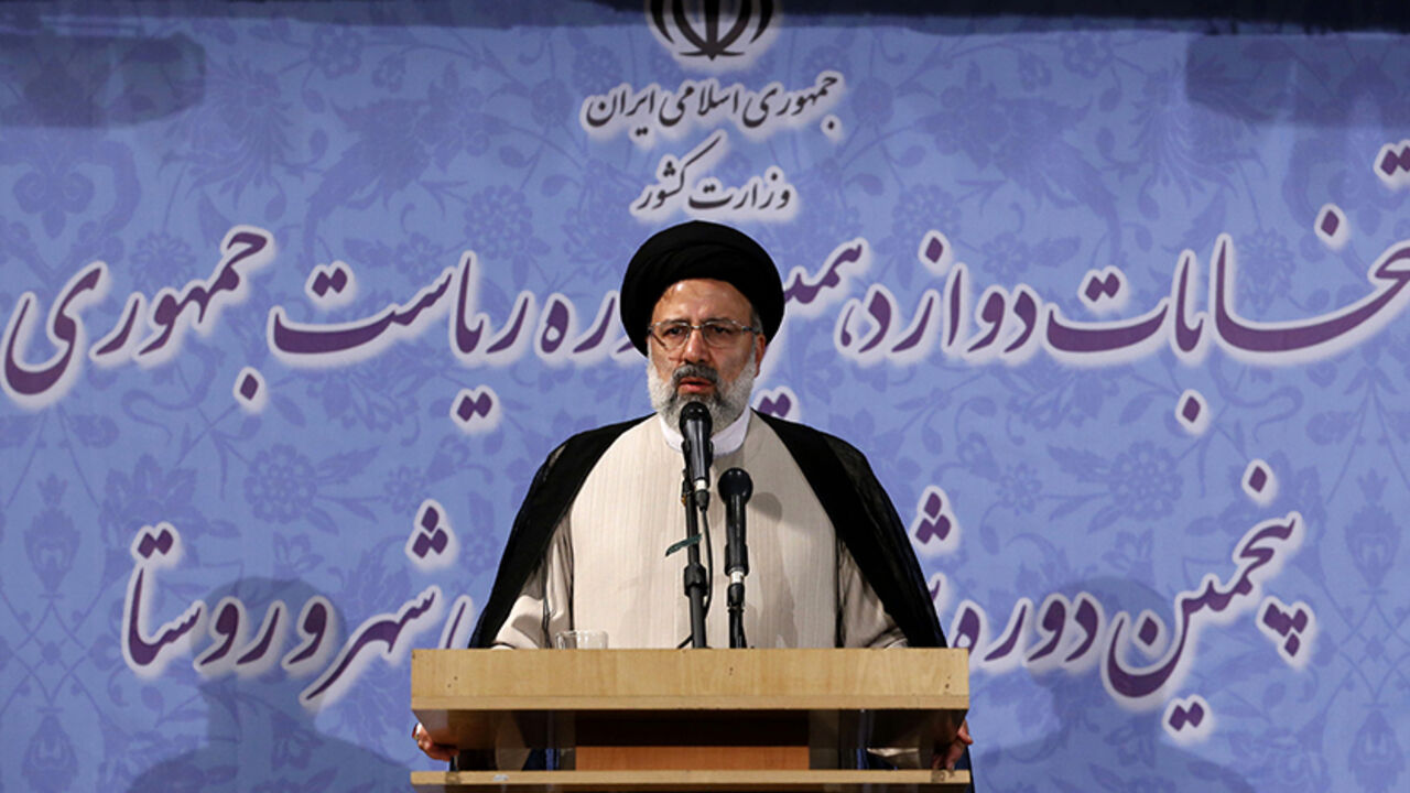 AFP_NK0W1 Iranian cleric and head of the Imam Reza charitable foundation, Ebrahim Raisi, delivers a speech after registering his candidacy for the upcoming presidential elections in the capital Tehran on April 14, 2017. / AFP PHOTO / ATTA KENARE (Photo credit should read ATTA KENARE/AFP/Getty Images)