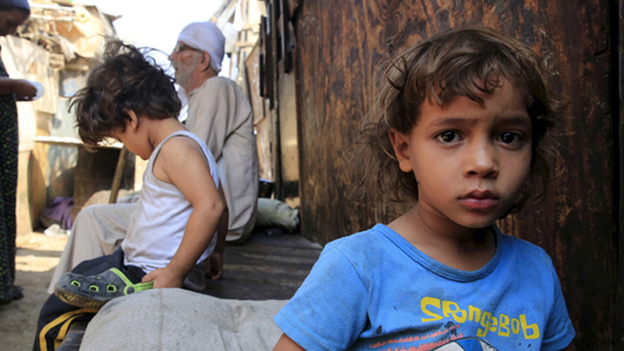 A Picture And Its Story: Life In Eshash el-Sudan A boy stands in the Eshash El-Sudan slum in the Dokki neighbourhood of Giza, south of Cairo, Egypt, September 2, 2015. Residents of the slum clashed with police in late August, when about 50 ramshackle huts were destroyed and at least 20 people were injured by teargas, local media reported, as authorities attempt to clear the area and rehouse residents. The slum dwellers, some of whom have called Eshash el-Sudan home for 50 years, say there are not enough apartments built nearby to house them. The residents