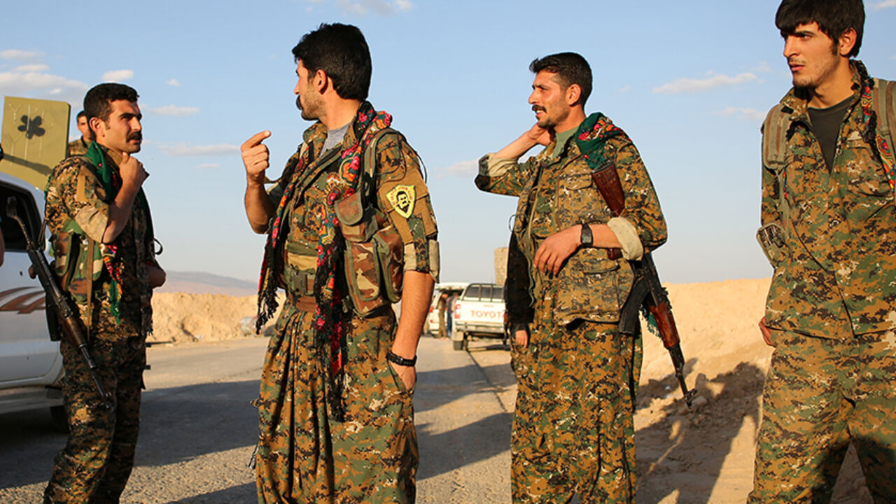 MIDEAST-CRISIS/IRAQ-SINJAR Members of the Sinjar Resistance Units (YBS), a militia affiliated with the Kurdistan Workers’ Party (PKK), stand in the village of Umm al-Dhiban, northern Iraq, April 29, 2016. They share little more than an enemy and struggle to communicate on the battlefield, but together two relatively obscure groups have opened up a new front against Islamic State militants in a remote corner of Iraq. The unlikely alliance between the Sinjar Resistance Units, an offshoot of a leftist Kurdish organisation, and Abdulkhal
