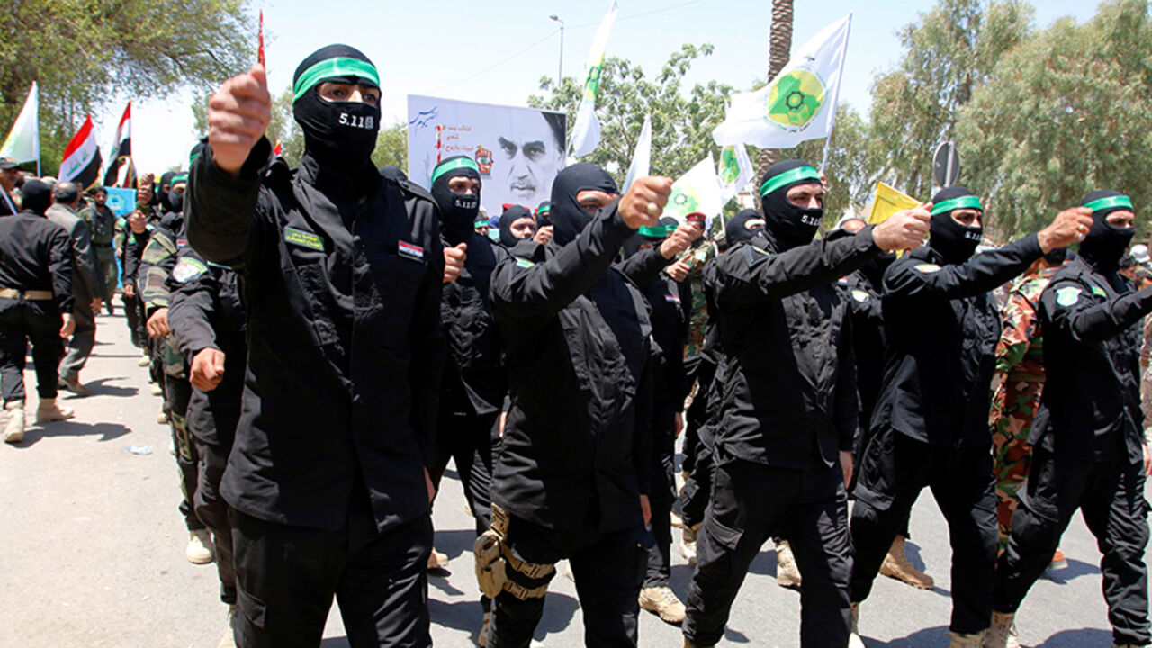IRAQ-RELIGION/ Iraqi Shi'ite Muslims from Hashid Shaabi (Popular Mobilization) march during a parade marking the annual al-Quds Day, or Jerusalem Day, during the Muslim holy month of Ramadan in Baghdad, Iraq July 1, 2016. REUTERS/Khalid al Mousily - RTX2J7WU