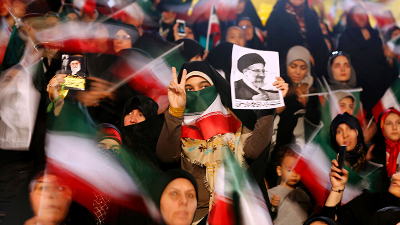 AFP_NZ3JN TOPSHOT - Supporters of Iranian presidential candidate Ebrahim Raisi attend a campaign rally in the capital Tehran on April 29, 2017. / AFP PHOTO / ATTA KENARE (Photo credit should read ATTA KENARE/AFP/Getty Images)