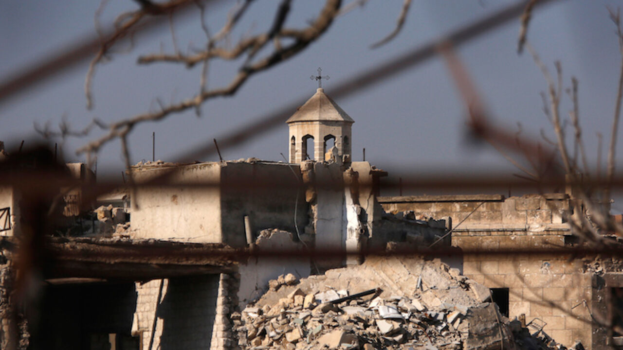 MIDEAST-CRISIS/SYRIA-ALEPPO A part of a church is seen amid the damage in the government-controlled area of the Old City of Aleppo, Syria December 10, 2016. REUTERS/Omar Sanadiki - RTX2UEEY