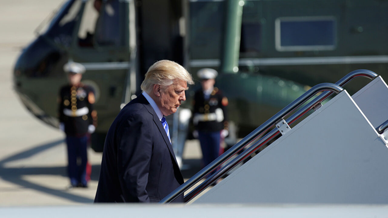 U.S. President Donald Trump boards Air Force One as he departs from Joint Base Andrews in Maryland, U.S. May 17, 2017. REUTERS/Kevin Lamarque - RTX367P8