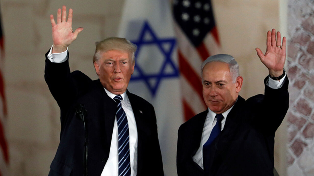 USA-TRUMP/ISRAEL U.S. President Donald Trump and Israeli Prime Minister Benjamin Netanyahu wave after Trump's address at the Israel Museum in Jerusalem May 23, 2017. REUTERS/Ronen Zvulun - RTX378DP