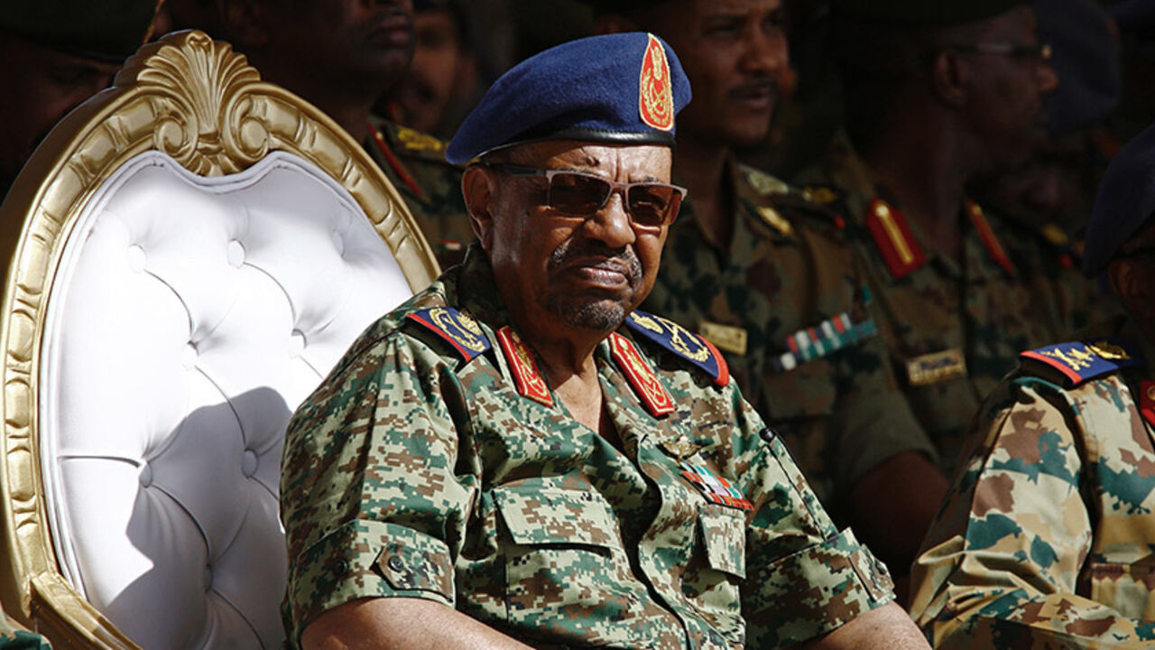 AFP_NE7SH Sudanese President Omar al-Bashir watches the joint Sudan and Saudi Arabia air force drill at the Marwa air base, near Meroe some 350 kilometres north of Khartoum, on April 9, 2017.
The drills were aimed at improving the operational capacities of the two air forces, improving techniques related to air operations and promoting cooperation. / AFP PHOTO / ASHRAF SHAZLY (Photo credit should read ASHRAF SHAZLY/AFP/Getty Images)