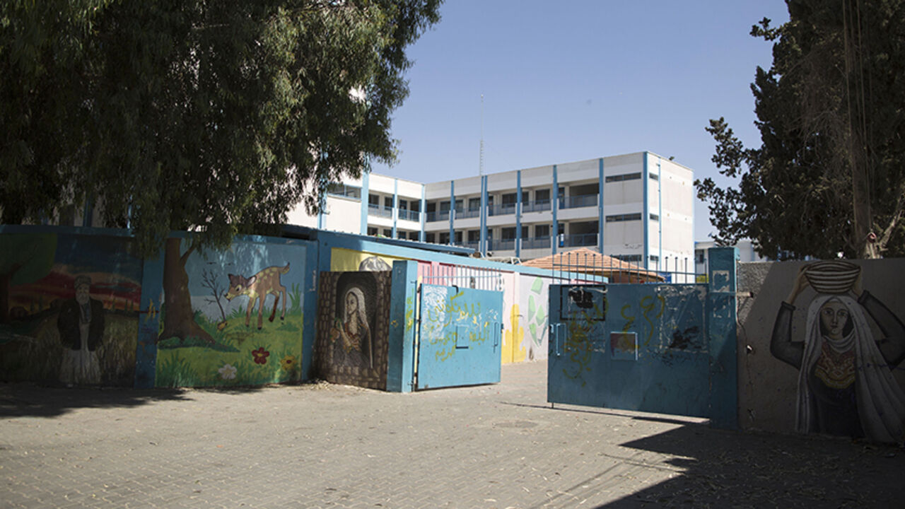 AFP_PF8AY A picture taken on June 10, 2017 shows a general view of the entrance of a UN school at the al-Maghazi refugee camp, located in the centre of the Gaza Strip.
Palestinian Islamist movement Hamas has denied that it or any other militant group built a tunnel under two UN schools in Gaza after its discovery drew a strong UN protest. On June 1, the UN agency for Palestinian refugees (UNRWA) found "part of a tunnel that passes under two adjacent agency schools in the Maghazi camp" during construction work, spokes