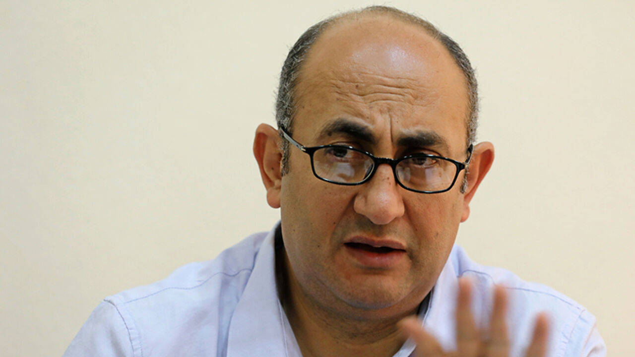 Egyptian lawyer and ex-Presidential candidate Khaled Ali, speaks during an interview with Reuters at his office in Cairo, Egypt, June 7, 2017. REUTERS/Mohamed Abd El Ghany - RTX39HJT
