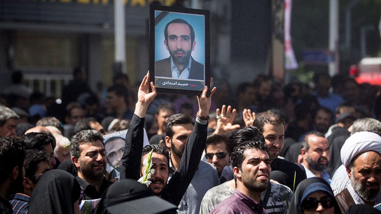 IRAN-SECURITY/FUNERAL People attend the funeral of the victims who were killed on the June 7 attack at the Iranian parliament and Ayatollah Khomeini's mausoleum, in Tehran, Iran June 9, 2017. TIMA via REUTERS ATTENTION EDITORS - THIS IMAGE WAS PROVIDED BY A THIRD PARTY. FOR EDITORIAL USE ONLY? - RTX39TEM