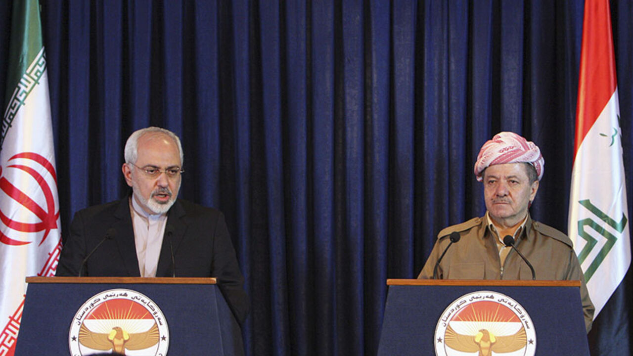 IRAQ-SECURITY/KURDS Iranian foreign minister Mohammad Javad Zarif (L) speaks during a news conference with Iraqi Kurdish regional President Masoud Barzani in Arbil, north of Baghdad, August 26, 2014. Iran supplied weapons and ammunition to Iraqi Kurdish forces, Barzani said Tuesday at a joint news conference with Zarif in Arbil, capital of Iraq's autonomous Kurdish region. REUTERS/Azad Lashkari (IRAQ - Tags: POLITICS TPX IMAGES OF THE DAY CONFLICT CIVIL UNREST) - RTR43T95