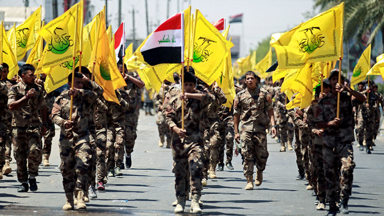 Iraqi Shi'ite Muslims from Hashid Shaabi (Popular Mobilization) march during a parade marking the annual al-Quds Day, or Jerusalem Day, in Baghdad, Iraq June 23, 2017. REUTERS/Khalid al Mousily - RTS18BPH