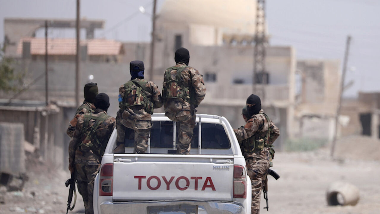 MIDEAST-CRISIS/SYRIA-RAQQA Syrian Democratic Forces are seen in Raqqa, Syria July 31, 2017. REUTERS/ Rodi Said - RTS19WAY