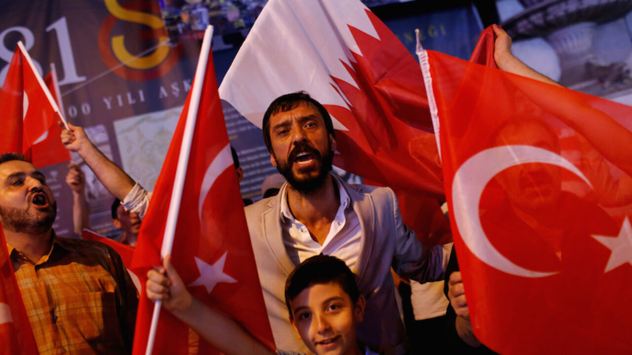 GULF-QATAR/TURKEY People shout slogans as they hold Turkish and Qatari flags during a demonstration in favour of Qatar in central Istanbul, Turkey, late June 7, 2017. REUTERS/Murad Sezer - RTX39JA6