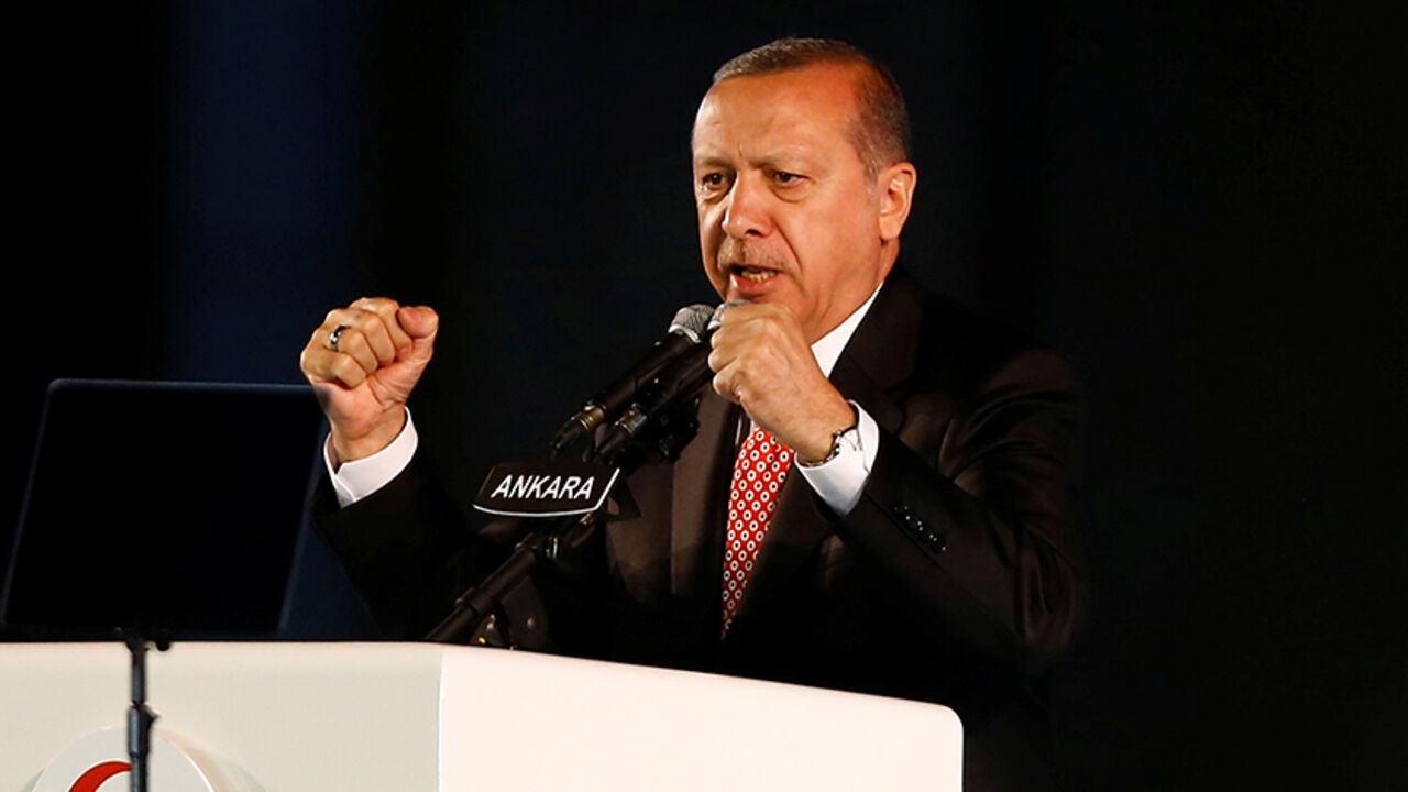 TURKEY-SECURITY/ANNIVERSARY Turkey's President Tayyip Erdogan addresses his supporters during a ceremony marking the first anniversary of the attempted coup in front of the Turkish Parliament in Ankara, Turkey July 16, 2017. REUTERS/Umit Bektas - RTX3BN1M