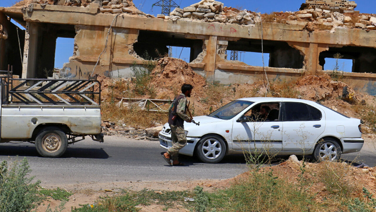 Members from a coalition of rebel groups called "Jaish al Fateh", also known as "Army of Fatah" (Conquest Army), man a checkpoint in Idlib city, Syria July 18, 2017. Picture taken July 18, 2017. REUTERS/Ammar Abdullah - RTX3C9L9