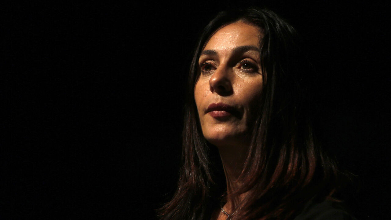 AFP_HZ9EK Israeli Culture and Sports minister Miri Regev speaks before the actors from Habima, the national theatre of Israel, performed A Simple Story, a dramatised version of Shmuel Yosef Agnon's Sipur Pashut, in the Israeli settlement of Kiryat Arba on the outskirts of the West Bank city of Hebron on November 10, 2016.
The Israeli national theater company has performed in an infamous settlement in the occupied West Bank for the first time, attracting praise from the rightwing government and strong criticism in th