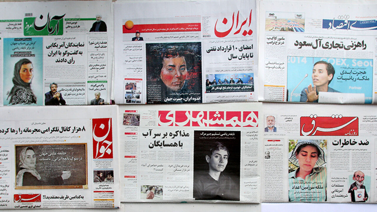 AFP_QN02F A picture taken in the capital Tehran on July 16, 2017 shows the front pages of Iranian newspapers bearing portraits of the top female scientist Maryam Mirzakhani, who died of cancer a day earlier.
Iranian-born mathematician, who became the first woman to win the coveted Fields Medal in 2014, died on July 15 in a US hospital after the breast cancer she had been battling for four years spread to her bone marrow, at the age of 40. / AFP PHOTO / ATTA KENARE (Photo credit should read ATTA KENARE/AFP/Get