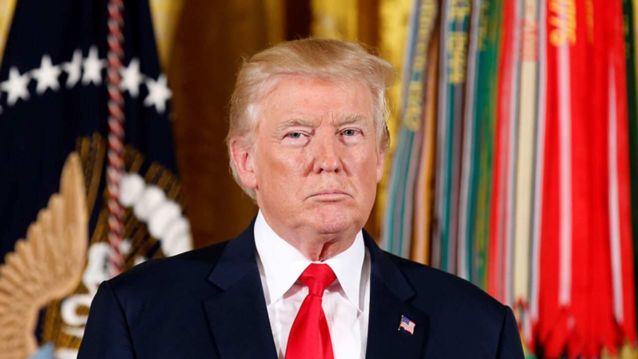 USA-TRUMP/MEDAL U.S. President Donald Trump awards the Medal of Honor to James McCloughan, who served in the U.S. Army during the Vietnam War, during a ceremony at the White House in Washington, U.S. July 31, 2017. REUTERS/Joshua Roberts - RTS19WJR