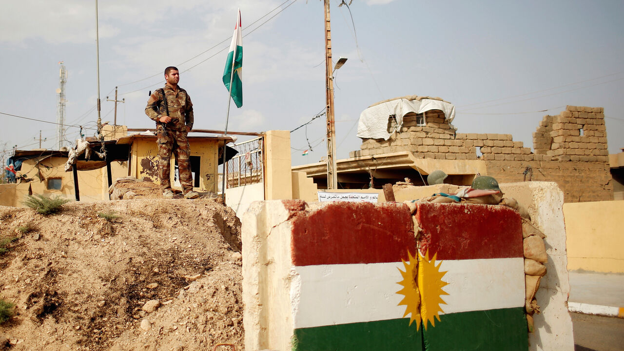 MIDEAST-CRISIS/IRAQ-YAZIDIS A member of Kurdish security forces stands guard in Sinjar region, Iraq August 2, 2017. Picture taken August 2, 2017. REUTERS/Suhaib Salem - RTS1A8QS