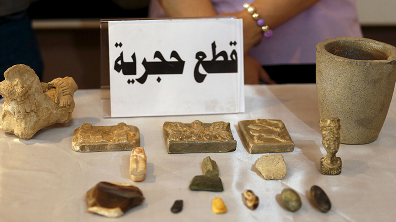 MIDEAST-CRISIS/IRAQ-ANTIQUITIES Recovered artifacts are seen at the National Museum of Iraq in Baghdad July 15, 2015. The U.S. handed back to Iraq on Wednesday antiquities it said it had seized in a raid on Islamic State fighters in Syria, saying the haul was proof the militants were funding their war by smuggling ancient treasures. The Iraqi relics were captured by U.S. special forces in an operation in May against an Islamic State commander known as Abu Sayyaf. They included ancient cylindrical stamps, pottery, metallic bracelets and ot