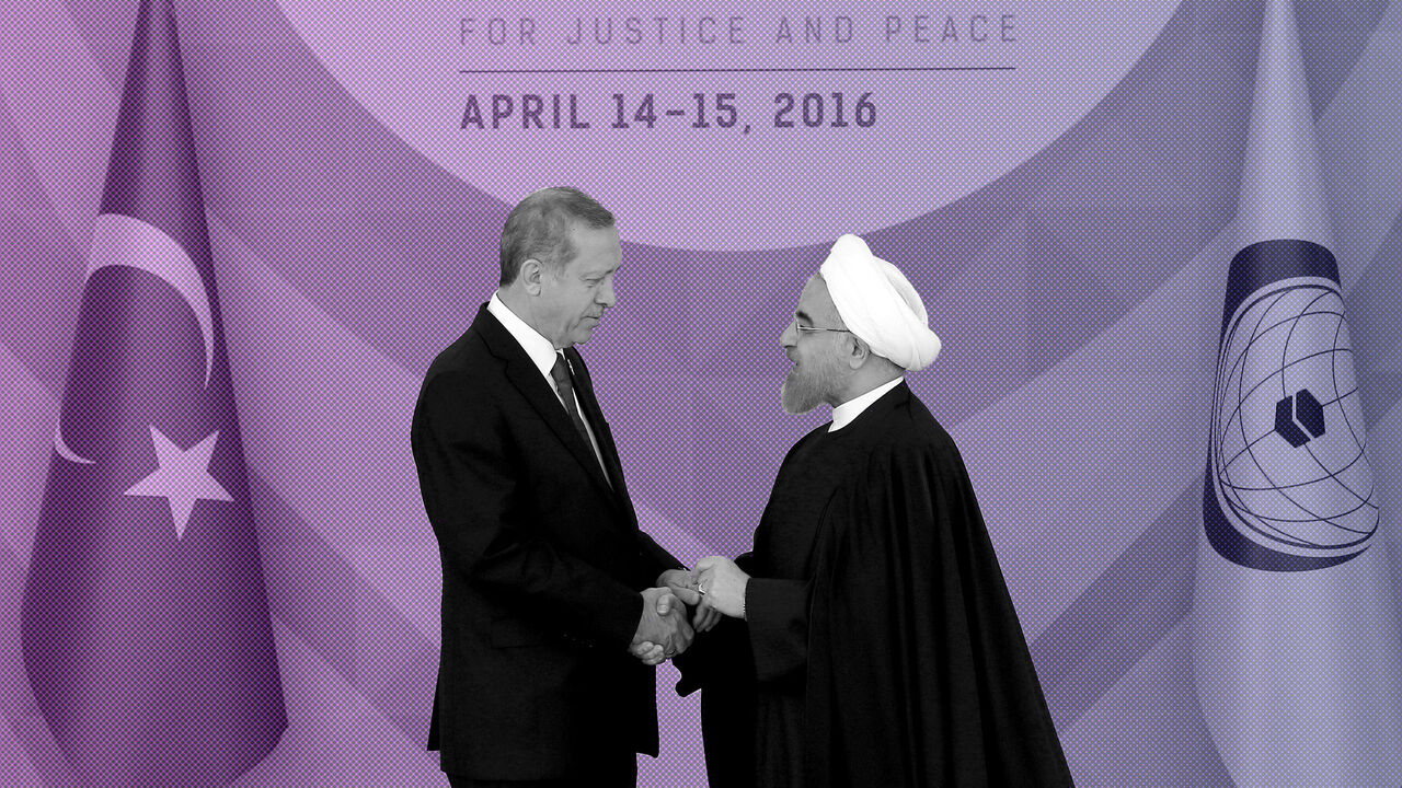 Turkish President Tayyip Erdogan (L) welcomes his Iranian counterpart Hassan Rouhani during the Organisation of Islamic Cooperation (OIC) Istanbul Summit in Istanbul, Turkey April 14, 2016. REUTERS/Berk Ozkan/Pool      TPX IMAGES OF THE DAY      - RTX29X07
