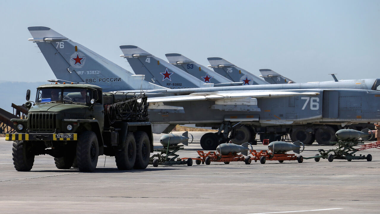MIDEAST-CRISIS/SYRIA-RUSSIA Russian military jets are seen at Hmeymim air base in Syria, June 18, 2016. Picture taken June 18, 2016. REUTERS/Vadim Savitsky/Russian Defense Ministry via Reuters ATTENTION EDITORS - THIS IMAGE WAS PROVIDED BY A THIRD PARTY. EDITORIAL USE ONLY. - RTX2H2BC