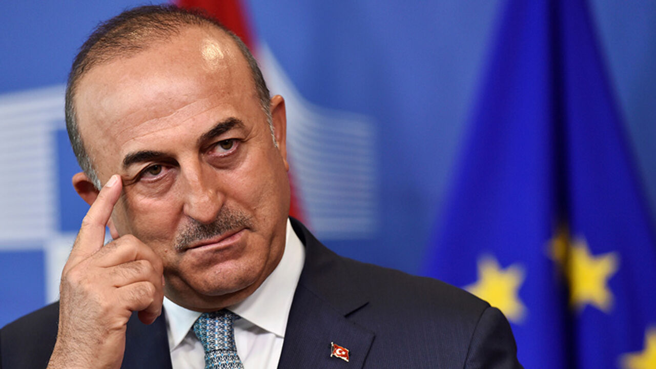 GERMANY-TURKEY/MINISTER Turkish Foreign Minister Mevlut Cavusoglu gestures during a news conference at the European Commission in Brussels, Belgium July 25, 2017. REUTERS/Eric Vidal - RTX3CUTU