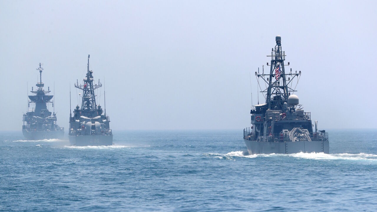 AFP_PL81X US and Qatari navy vessels are seen during a joint military exercise between Qatar and the US navy, in Doha, on June 16, 2017.
The United States agreed a $12-billion warplane sale to Qatar and began manoeuvres with its military on June 15, re-affirming support for the emirate in the throes of a diplomatic crisis with its neighbours. / AFP PHOTO / KARIM JAAFAR (Photo credit should read KARIM JAAFAR/AFP/Getty Images)