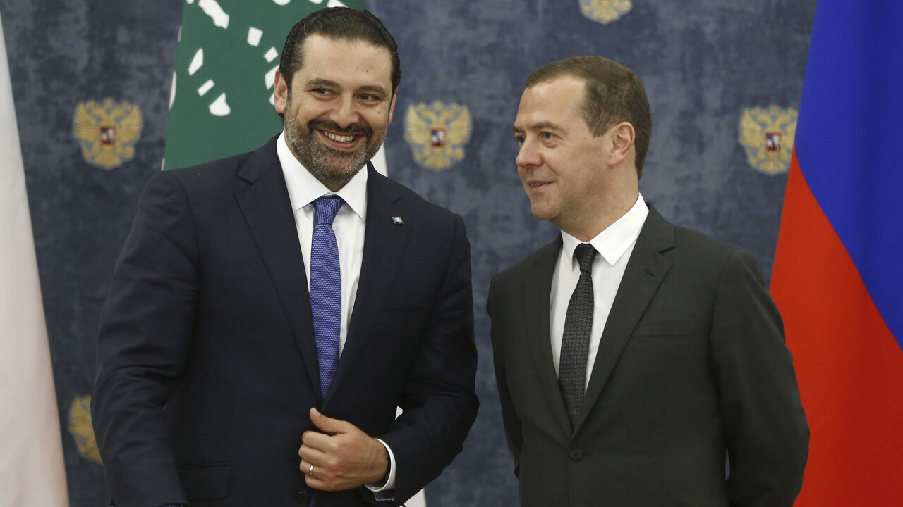 RUSSIA-LEBANON/ Russian Prime Minister Dmitry Medvedev (R) and his Lebanese counterpart Saad al-Hariri attend a signing ceremony outside Moscow, Russia September 12, 2017. Sputnik/Dmitry Astakhov/Pool via REUTERS ATTENTION EDITORS - THIS IMAGE WAS PROVIDED BY A THIRD PARTY. - UP1ED9C1AWH0N