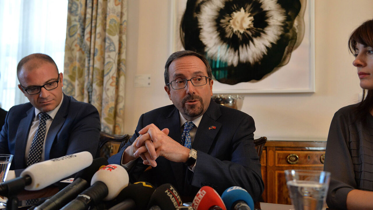 AFP_TA6R0 US Ambassador to Turkey John Bass delivers a press conference in Ankara on October 11, 2017.
President Recep Tayyip Erdogan vowed on October 10 that Turkish officials will boycott the US ambassador, deepening one of the worst rifts in decades between the NATO allies. Erdogan said Turkey no longer regarded outgoing envoy John Bass as the US representative to Turkey after American missions in the country stopped issuing visas.
/ AFP PHOTO / STR (Photo credit should read STR/AFP/Getty Images)