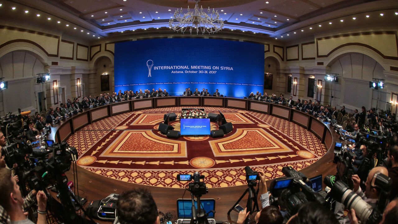 Representatives of the Syria regime and rebel groups along with other attendees take part in the session of Syria peace talks in Astana on October 31, 2017.
Russia, Turkey and Iran pledged in Kazakhstan on October 31, 2017 to bring the Syrian regime and its opponents together for a "congress" to help nudge peace efforts towards a more lasting political settlement. / AFP PHOTO / Stanislav FILIPPOV        (Photo credit should read STANISLAV FILIPPOV/AFP/Getty Images)