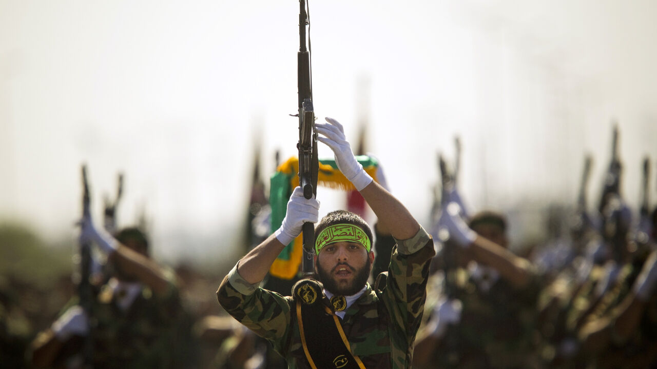 IRAN-PROPAGANDA/ EDITORS' NOTE: Reuters and other foreign media are subject to Iranian restrictions on their ability to report, film or take pictures in Tehran.
Members of Iran's Basij militia march during a parade to commemorate the anniversary of the Iran-Iraq war (1980-88), in Tehran September 22, 2010. Iranian leaders hoping to lift morale at a time of rising prices, food shortages and threats of attack from Israel, are drawing on memories of another era when people united against a common foe: Saddam Hussein's Iraq.