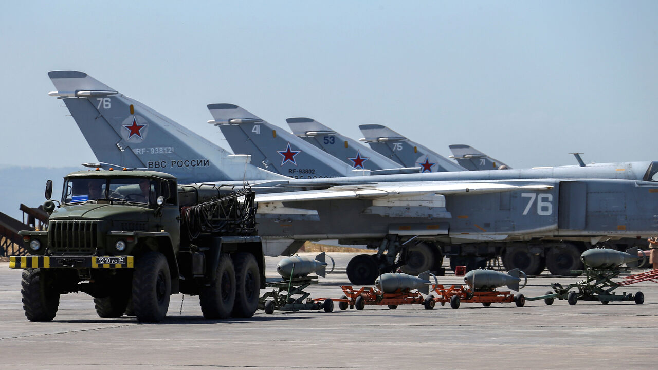 MIDEAST-CRISIS/SYRIA-RUSSIA Russian military jets are seen at Hmeymim air base in Syria, June 18, 2016. Picture taken June 18, 2016. REUTERS/Vadim Savitsky/Russian Defense Ministry via Reuters ATTENTION EDITORS - THIS IMAGE WAS PROVIDED BY A THIRD PARTY. EDITORIAL USE ONLY. TPX IMAGES OF THE DAY - S1AETKYKMIAA