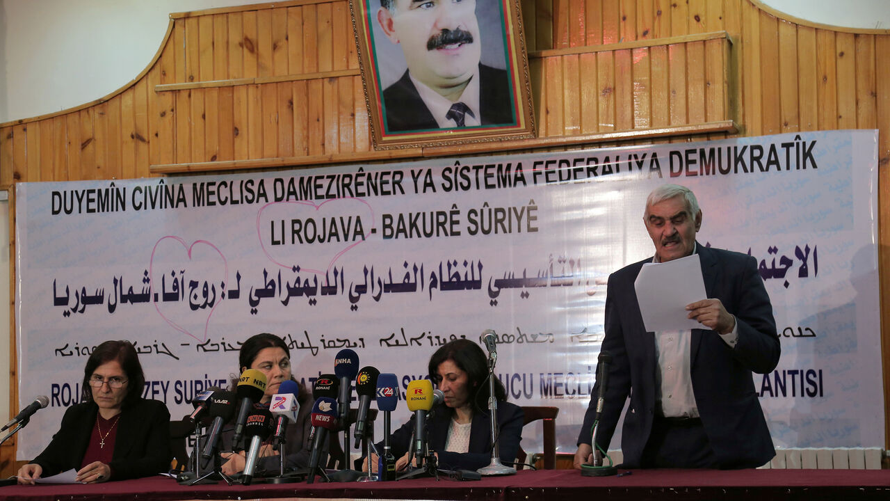 MIDEAST-CRISIS/SYRIA-KURDS Hadiya Yousef (2nd R) and other delegates take part in a conference in Syria's Kurdish-controlled northern regions, in the town of Rmeilan, Hasaka province, Syria December 29, 2016. REUTERS/Rodi Said - RC1D18A26700
