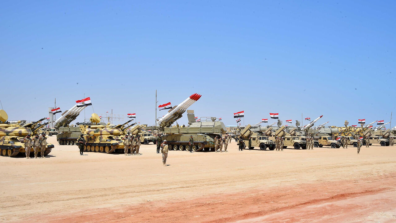 EGYPT-SECURITY/ Military students stand at attention to mark the opening of the Mohamed Najib military base, the graduation of new graduates from military colleges, and the celebration of the 65th anniversary of the July 23 revolution at El Hammam City in the North Coast, in Marsa Matrouh, Egypt, July 22, 2017 in this handout picture courtesy of the Egyptian Presidency. The Egyptian Presidency/Handout via REUTERS ATTENTION EDITORS - THIS IMAGE WAS PROVIDED BY A THIRD PARTY. - RC1831D7DF40