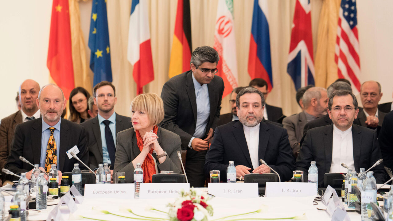 AFP_NU3Y7 Helga Maria Schmid (L), Secretary-General European External Action Service, Delegated Joint Commission Coordinator (EU), David Geer (2ndL), Head of the Sanctions Policy Division (EU), Seyed Abbas Araghchi (2ndR), Iran's Vice-Minister for Legal and International Affairs, Majid Takht-Ravanchi (R), Iran's Under-Secretary for European and American Affairs and senior diplomats from other six major powers meet in Vienna, on April 25, 2017 for a regular quarterly meeting to review adherence to their 2015 nuclear d
