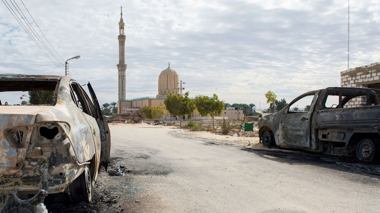 AFP_UL7IH A picture taken on November 25, 2017, shows the Rawda mosque, roughly 40 kilometres west of the North Sinai capital of El-Arish, after a gun and bombing attack.
Armed attackers killed at least 235 worshippers in a bomb and gun assault on the packed mosque in Egypt's restive North Sinai province, in the country's deadliest attack in recent memory. / AFP PHOTO / STR (Photo credit should read STR/AFP/Getty Images)